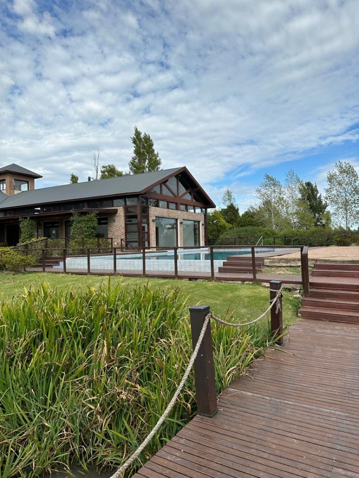 **u$s 29.900.-** - VENTA LOTE 1.150 M2 C/ESCRITURA - LOTE 66 - POSADA DE LOS LAGOS CLUB DE CAMPO - BRANDSEN - (FRENTE HARAS DEL SUR I) 